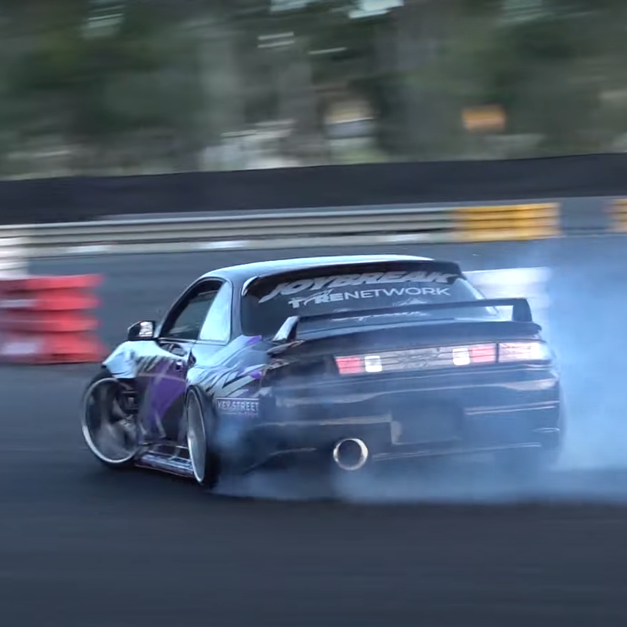 A 1JZ-powered Nissan Silvia pulls of a smoky drift